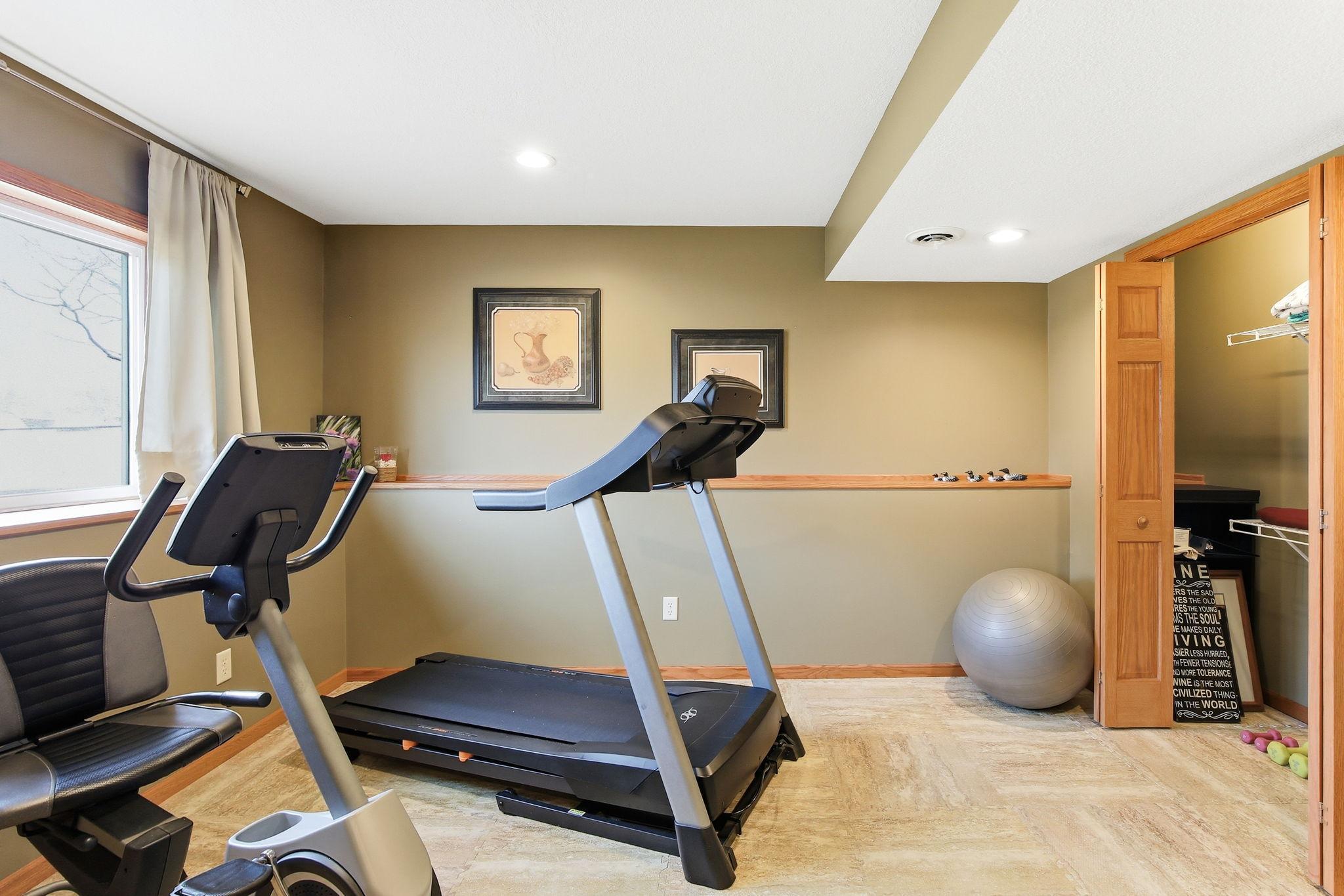 Pocket French doors lead to the 4th Bedroom. Seller has extra LVP floor that matches the Family room in case a new owner prefers that flooring.