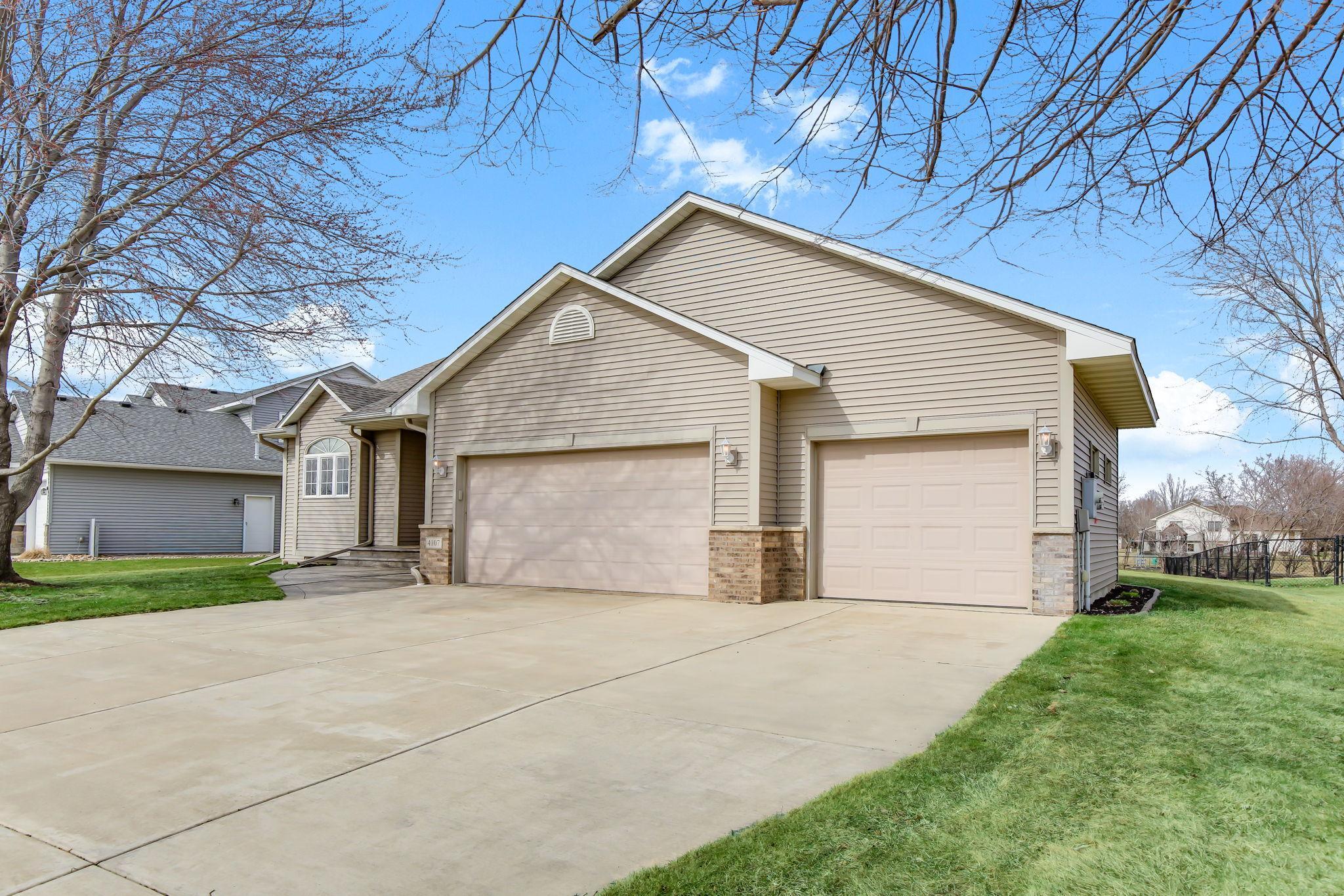 Large Concrete driveway & 3-Car Garage to enjoy!