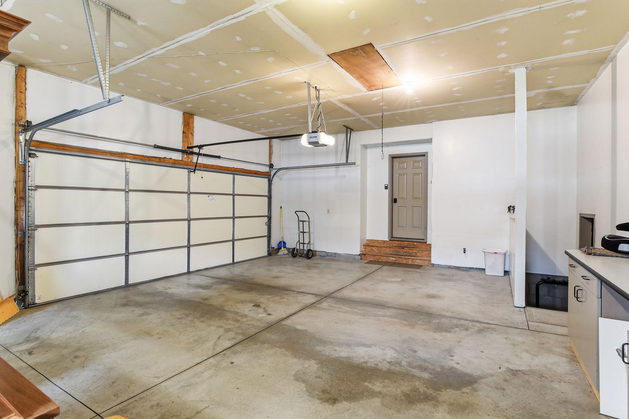 Garage Wired for AC & Plumbed for Gas Heater. Insulated Garage Doors & Ceiling.