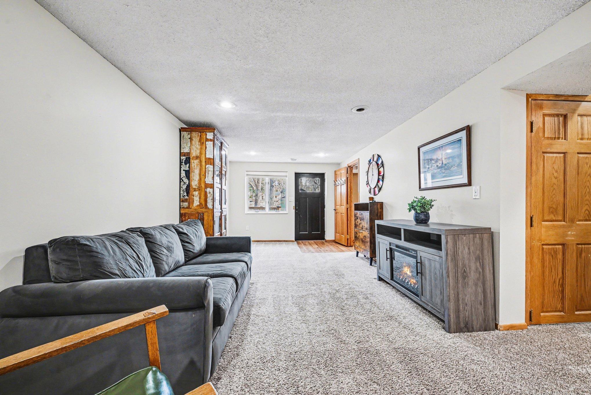 Lower level family room is ideal for movie nights!