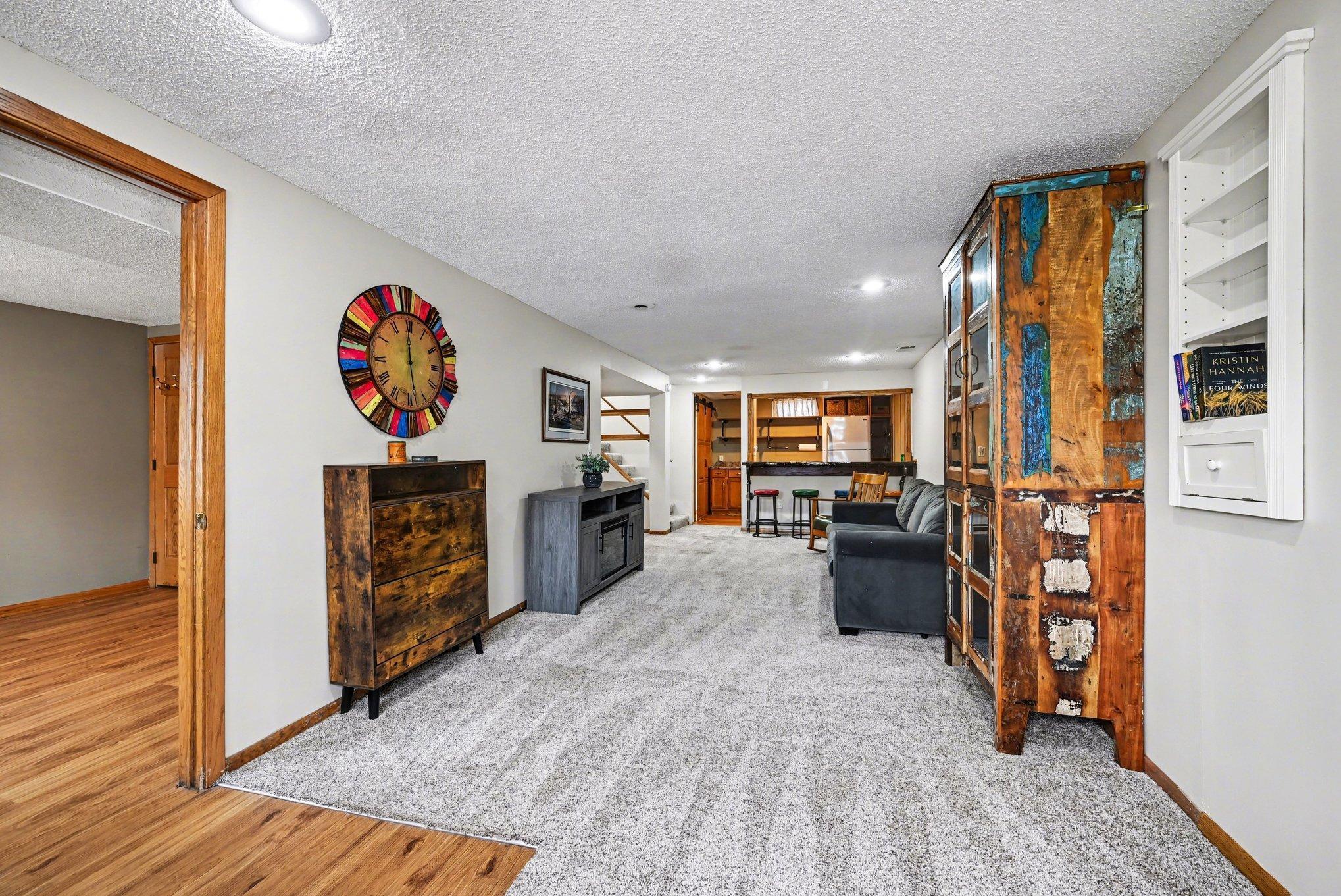 This level walks out to the driveway. Perfect for a renter or teen or?