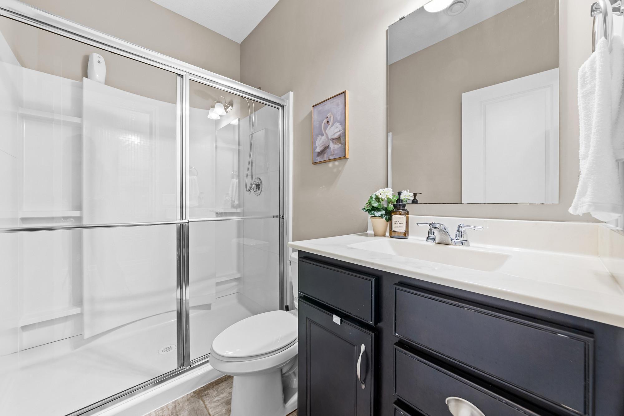 Main level 3/4 bath is great for guests