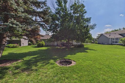 Backyard includes a firepit