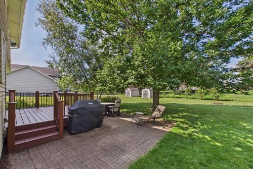 Patio to backyard has tremendous tree coverage and shade