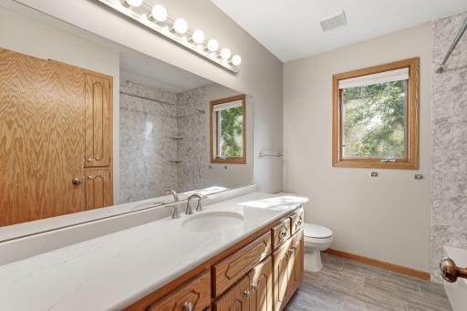 Upper level full bathroom: new flooring & countertops