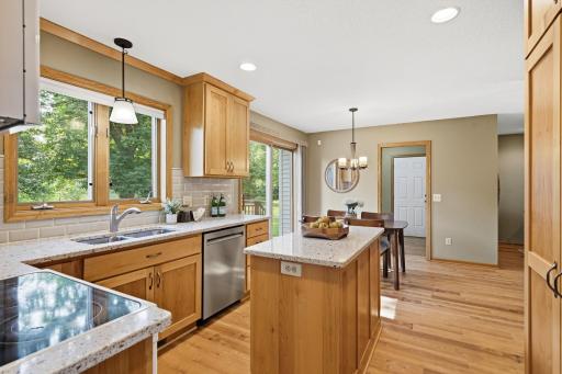 Kitchen with tons of natural light from the kitchen window and sliding room