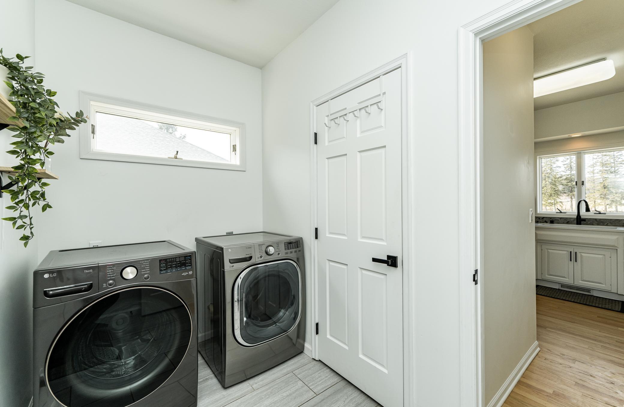 Main floor laundry with new washer/dryer 2022.