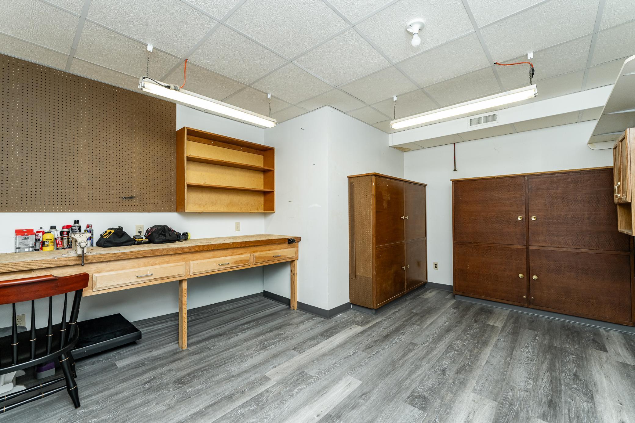 Huge finished bonus space in lower level! There is also an adjoining finished room for incredible additional storage...PLUS a big walk in closet at base of stairs for even more storage!