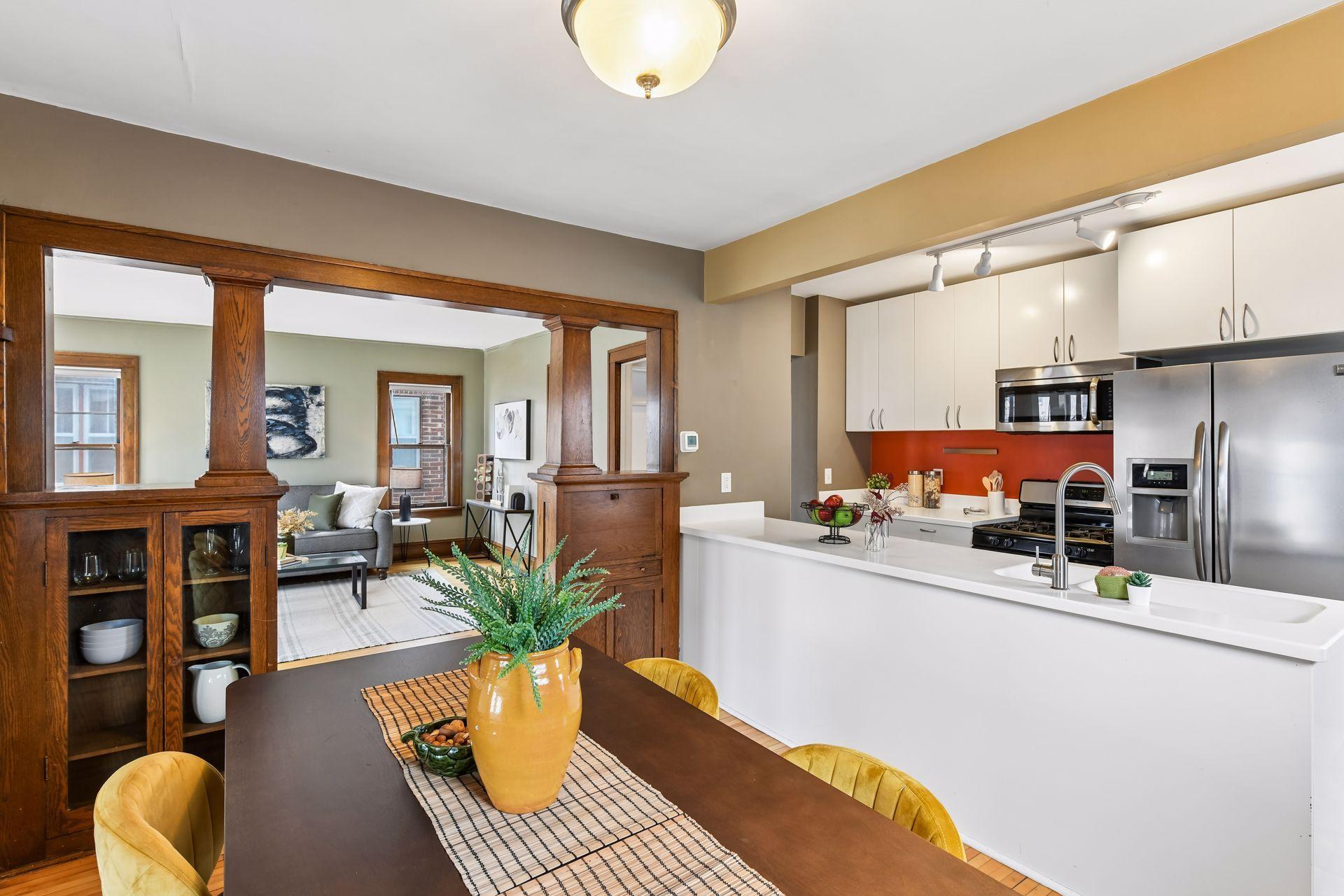 Kitchen featuring stone countertops and stainless appliances.