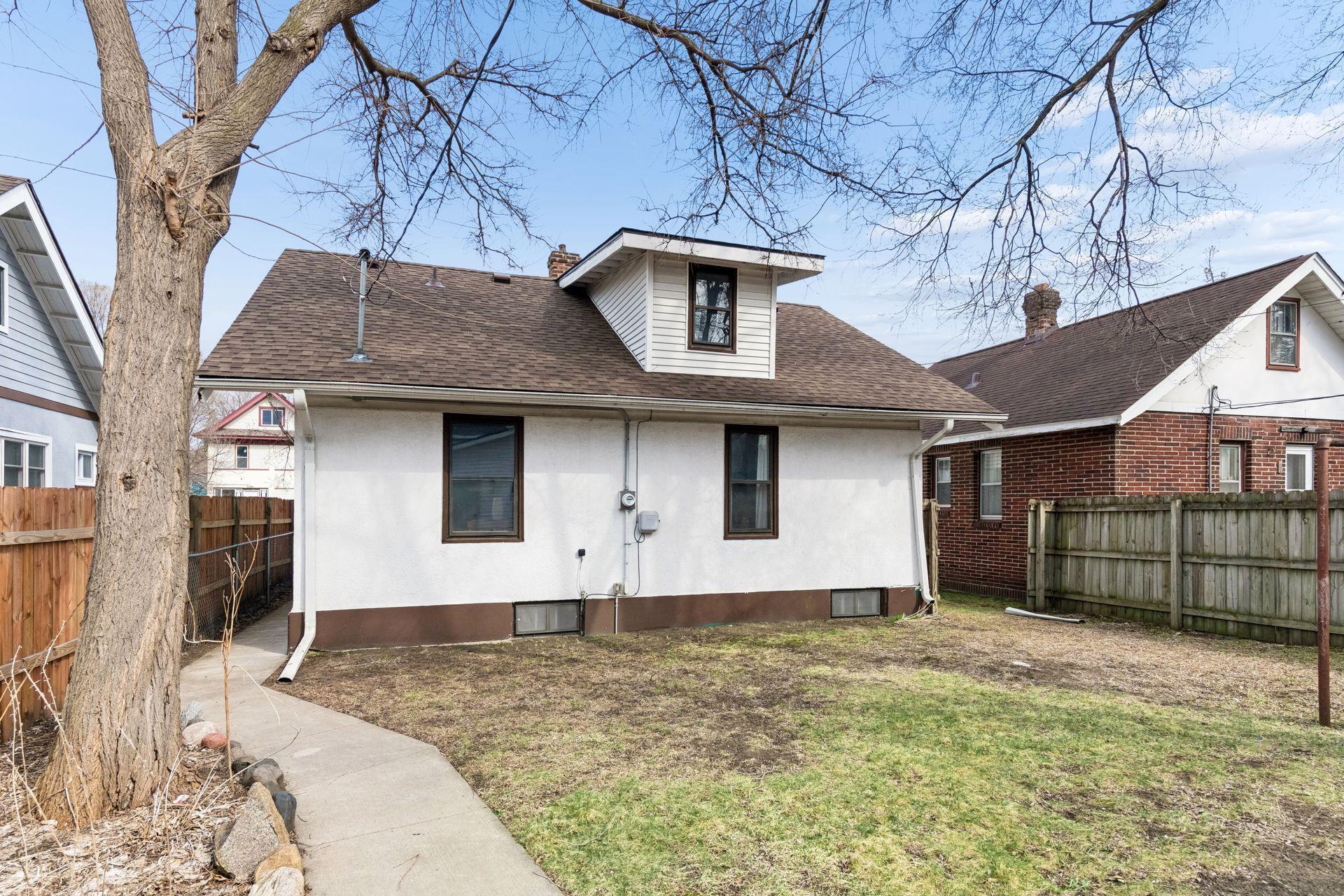 Fully fenced in yard offering privacy for summertime entertaining.
