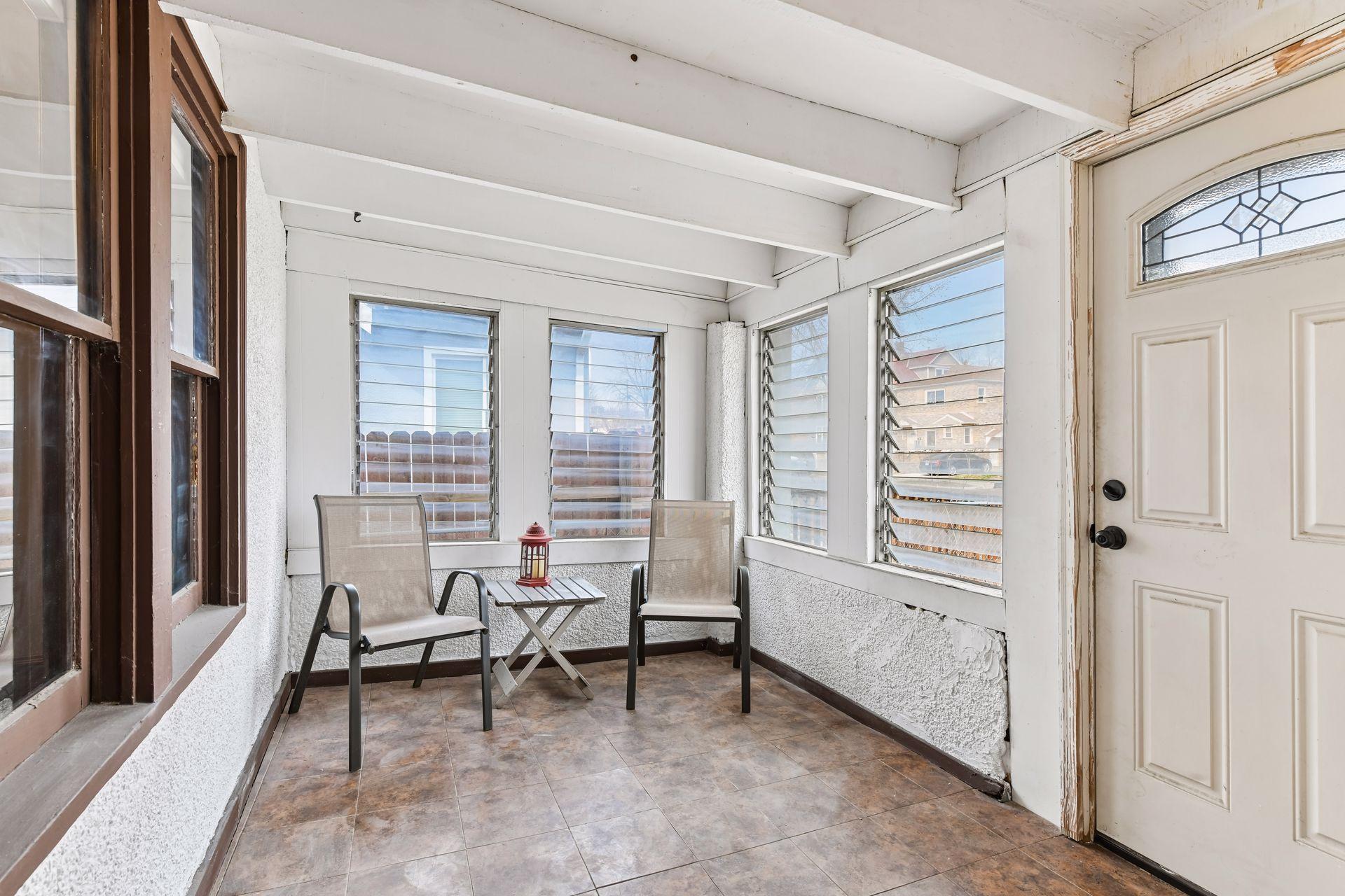 Enter through the cute front porch. through the front porch.