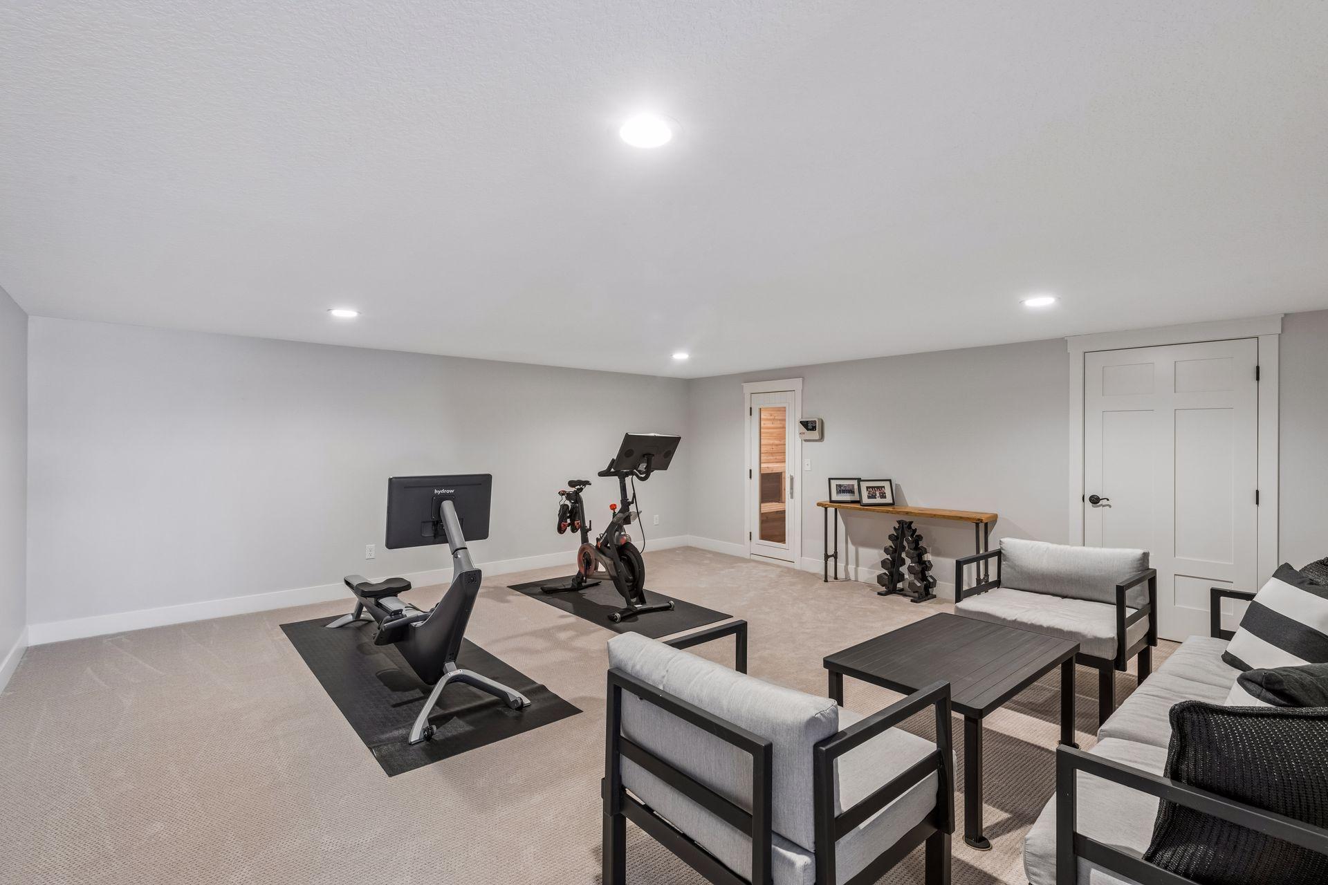 Maintain your wellness routine in the private home gym located just steps from the sauna