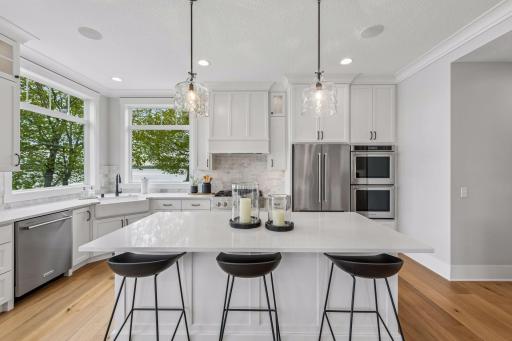 The expansive quartz center island will be the hub of your home.