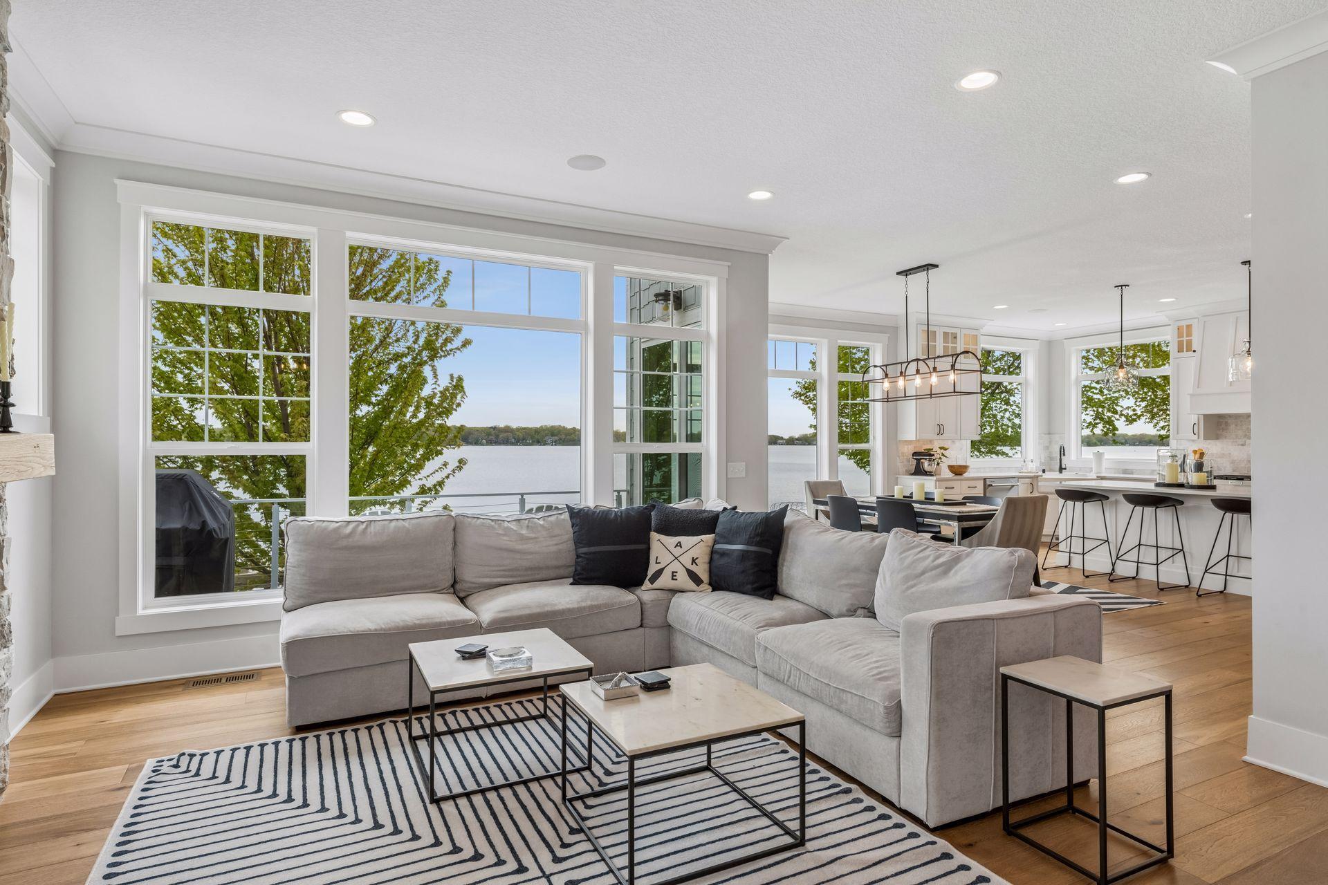 Floor-to-ceiling windows allow for panoramic lake views