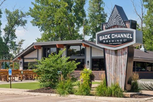 Back Channel Brewing is one of the lake's premier destination taprooms, offering small-batch brews and lakeside sauna sessions in a vibrant, social atmosphere.