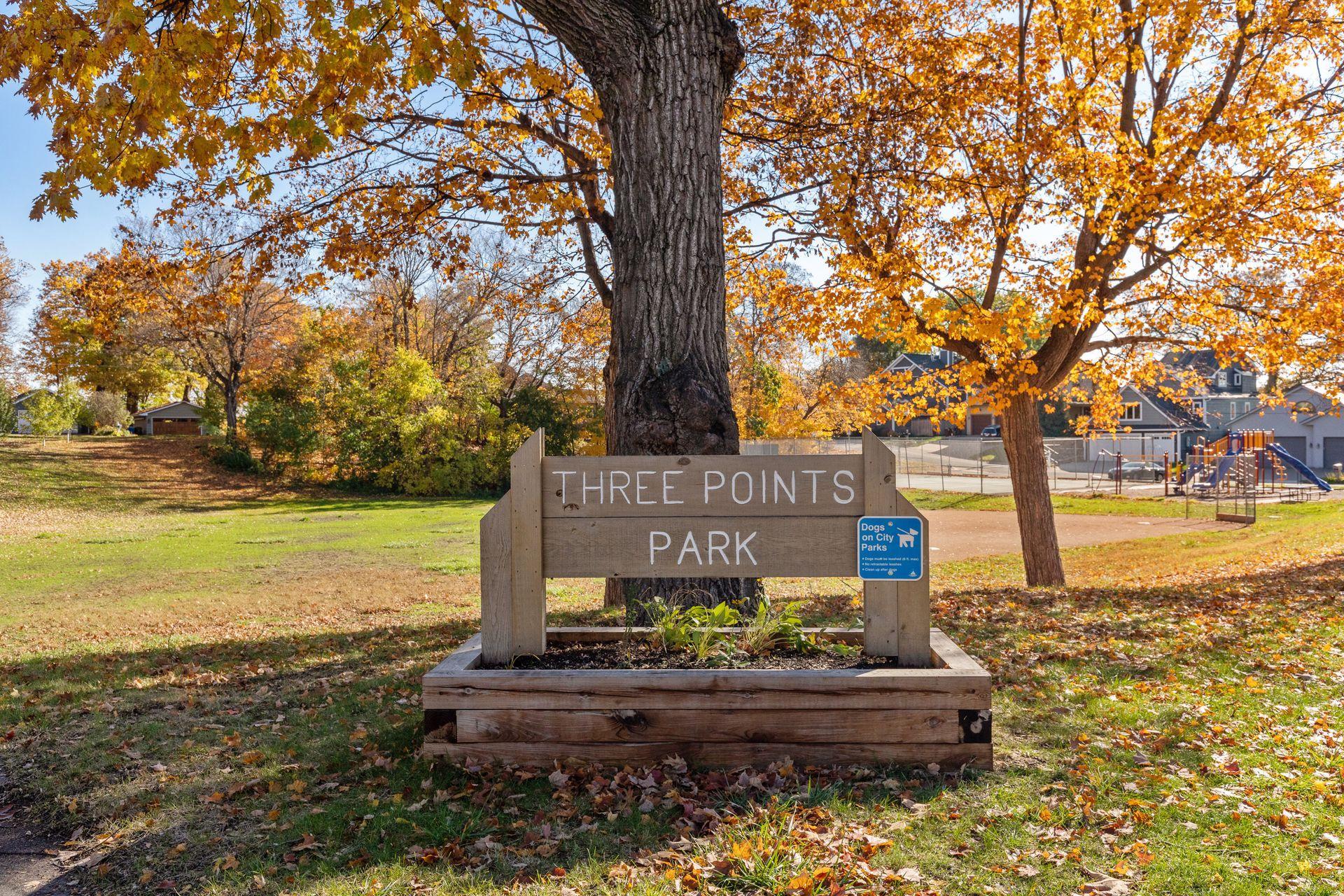 Three Points Park, a neighborhood favorite featuring a modern playground, basketball and tennis courts, and an open play field just a short stroll from your front door