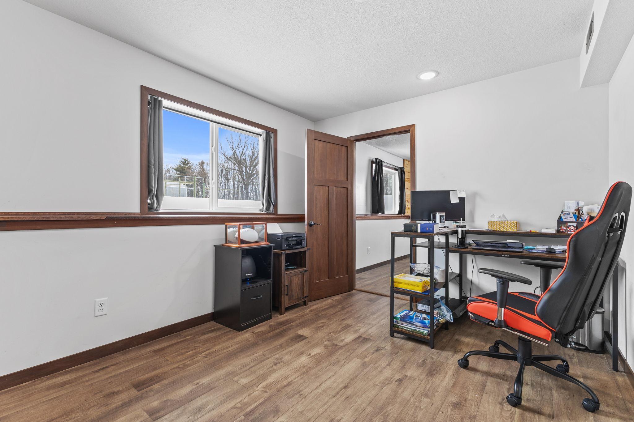 Office or bedroom with walk in closet