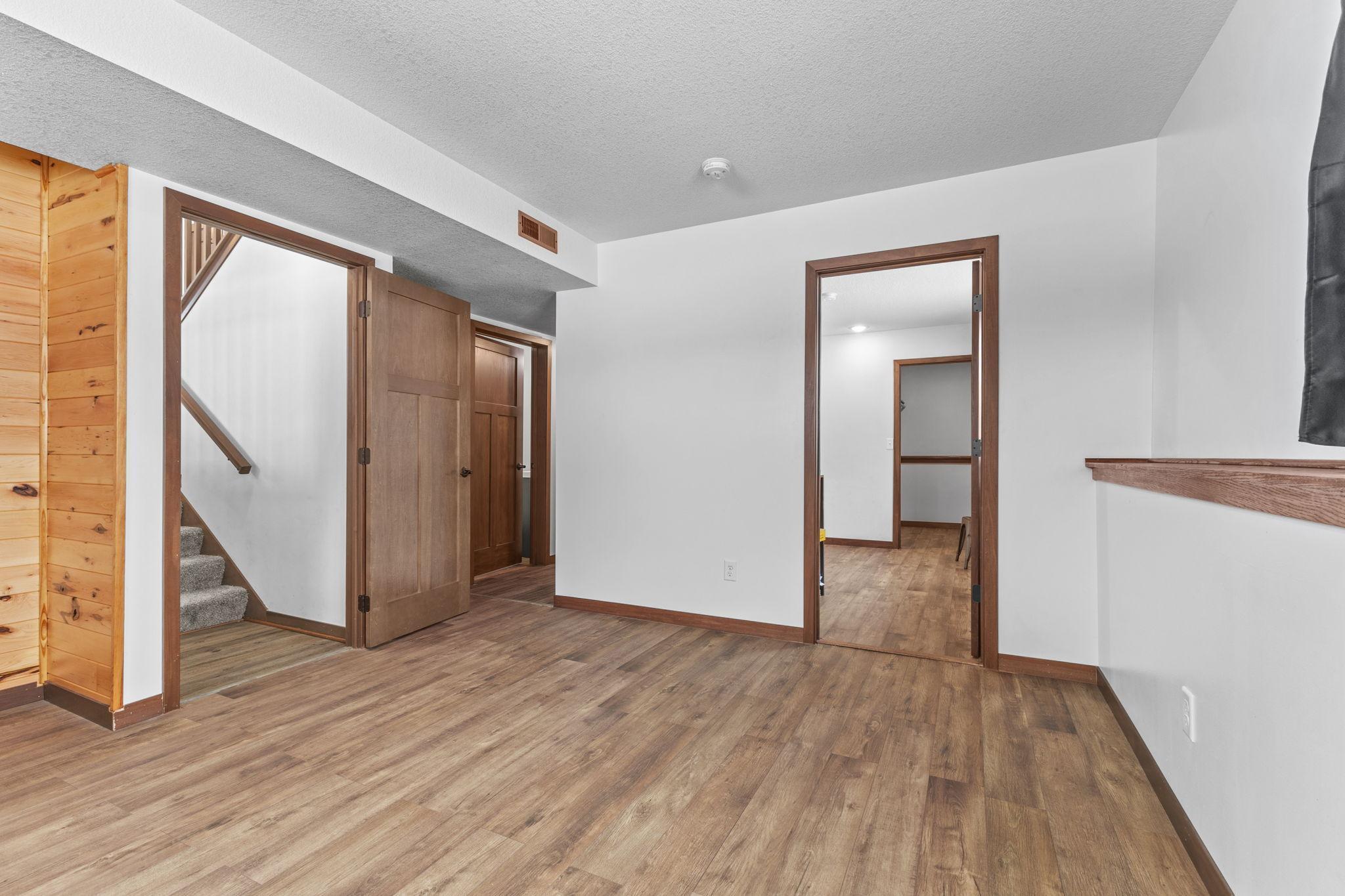 Lower level leads to another bedroom and bath