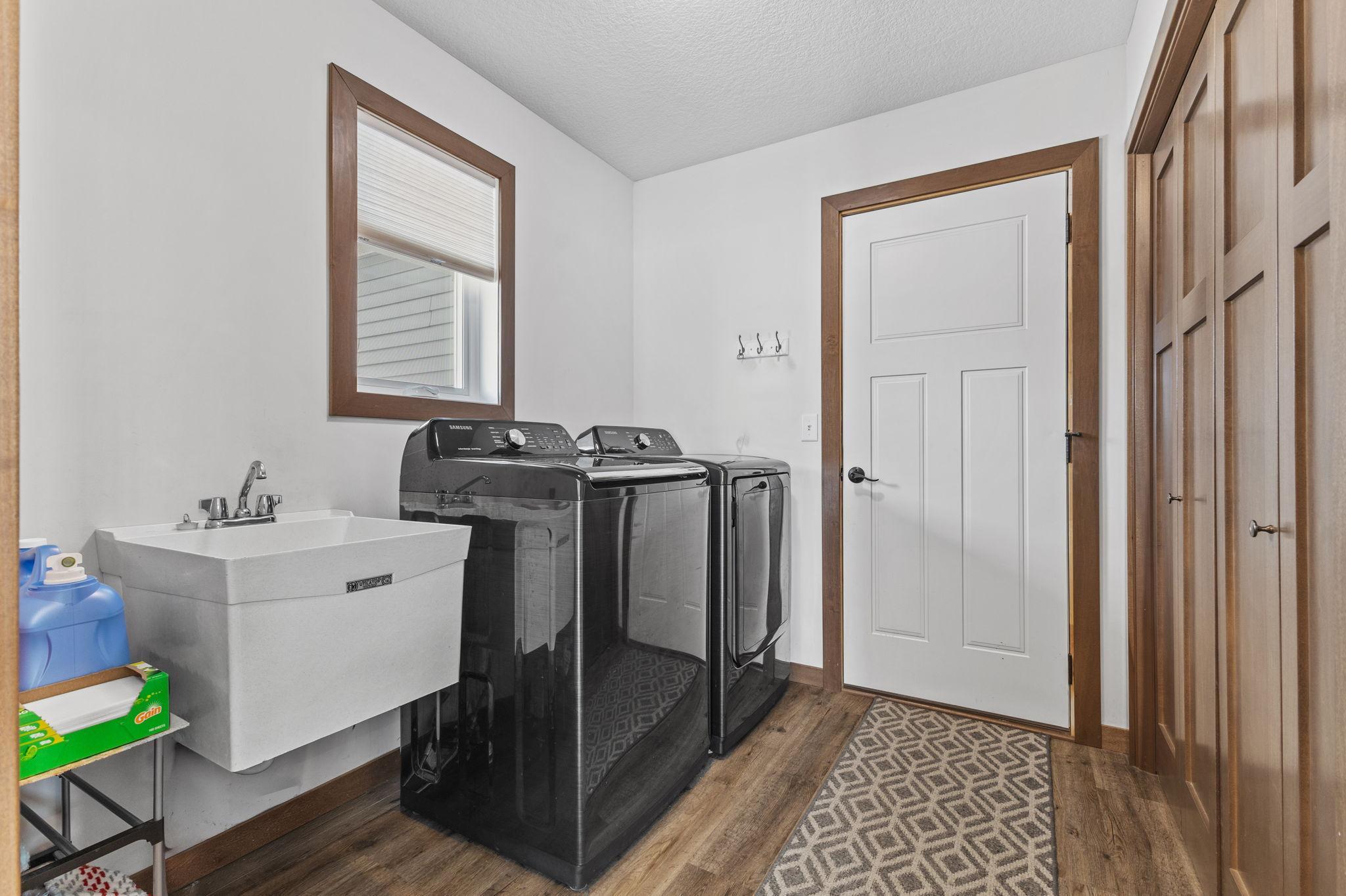 Main floor laundry with newer washer and dryer