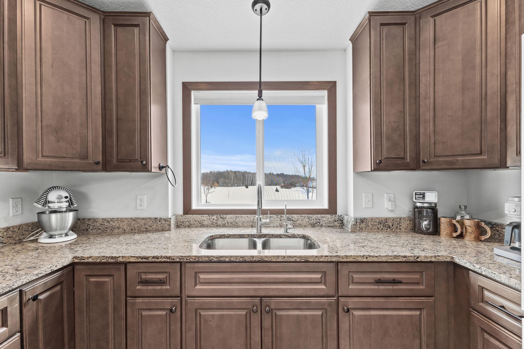 Kitchen window with view, stone countertops