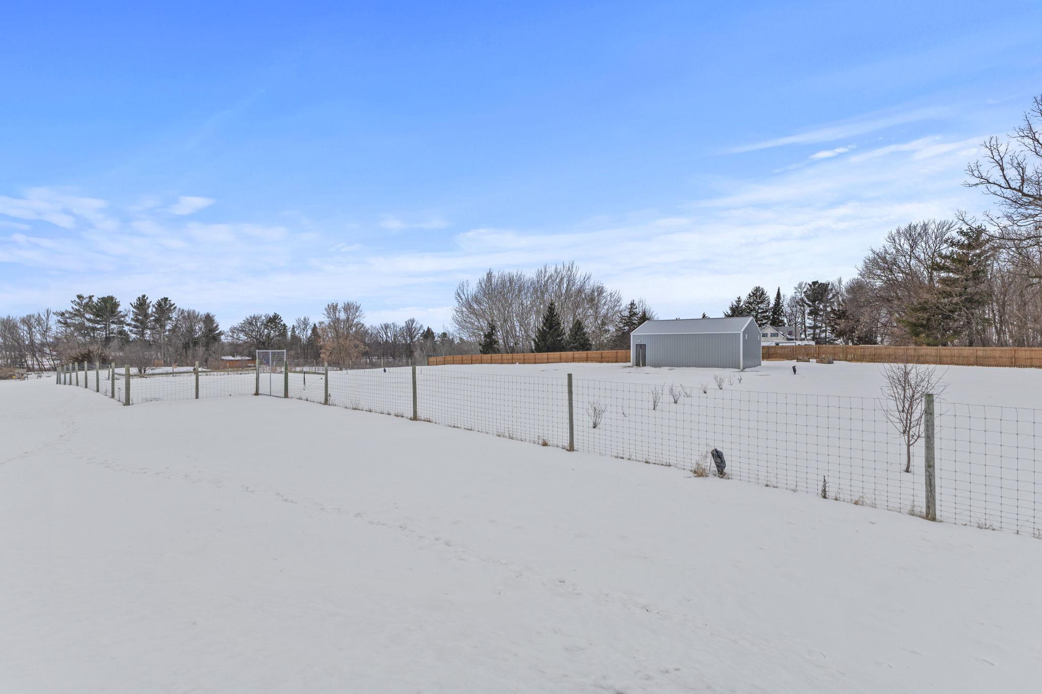 One acre of fenced area for animals or gardening.