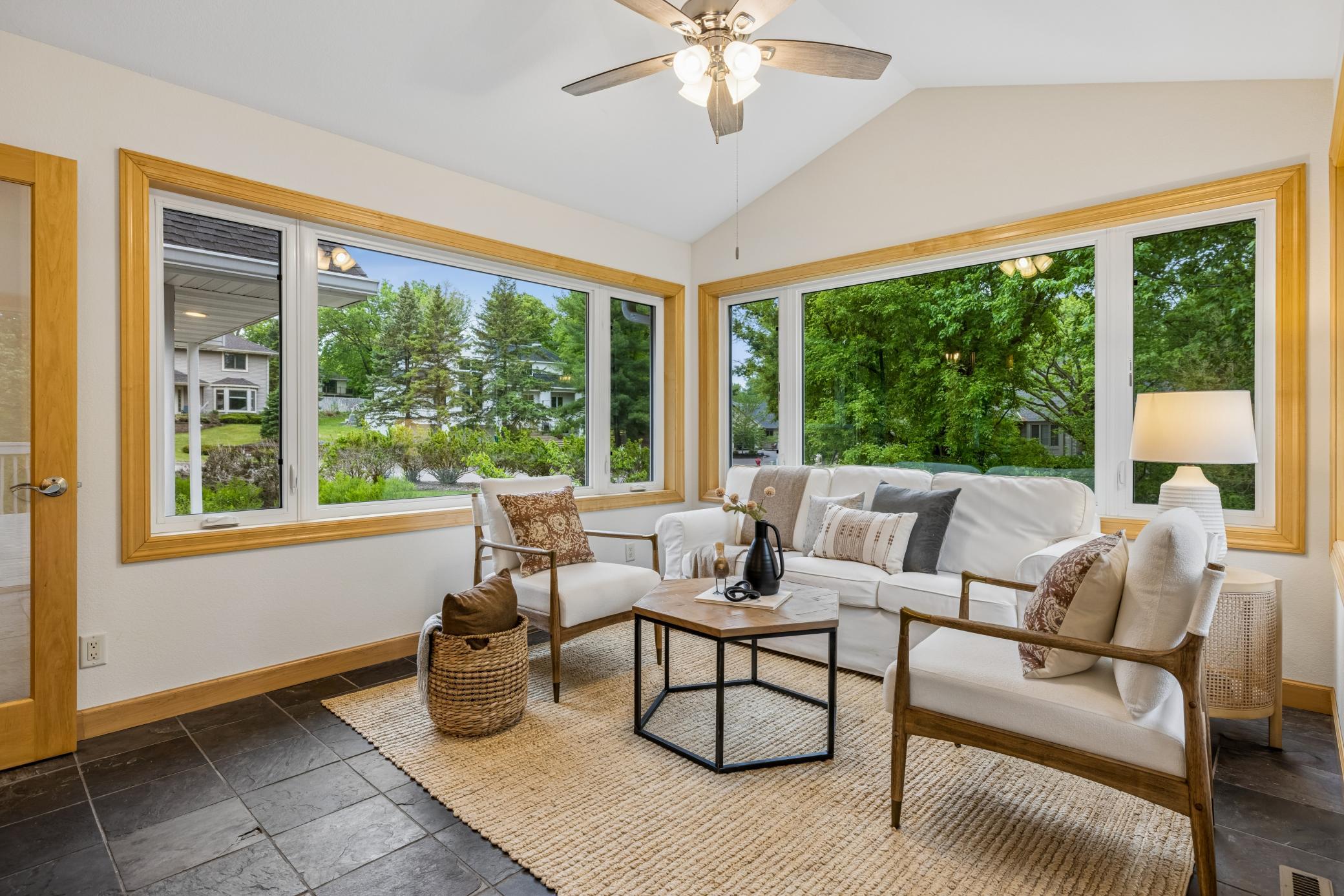 Four season porch overlooking the expansive backyard