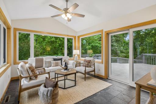 Four-season porch is the perfect place to unwind.