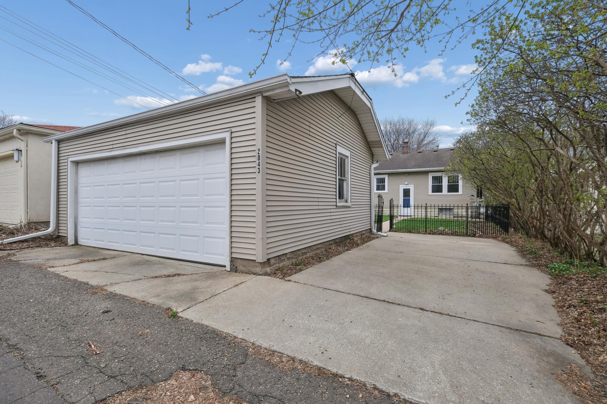 2 car garage + pad parking!