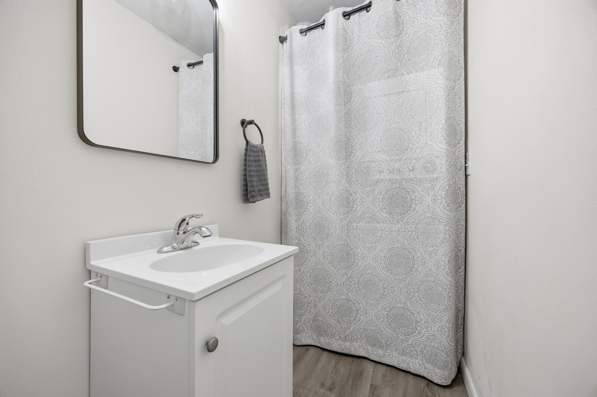 Private Half Bathroom w/Laundry