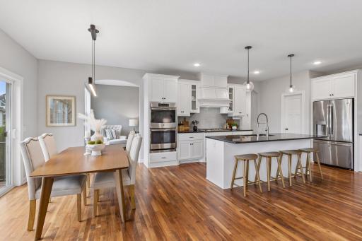 Formal dining space and breakfast bar