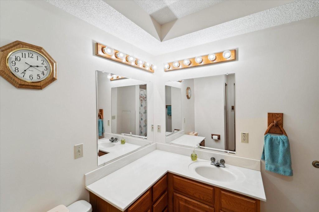 Lower-level bathroom with easy access from the recreation area and guest bedroom.