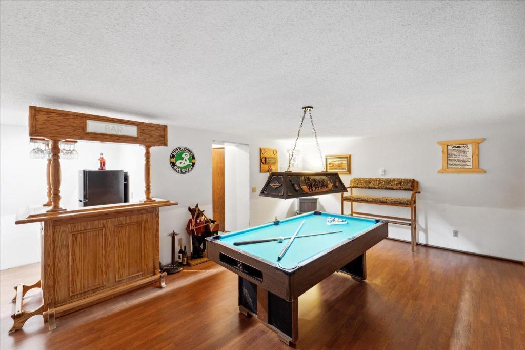 Lower-level recreation room with plenty of space for entertaining, game nights, or creating the ultimate gathering area.