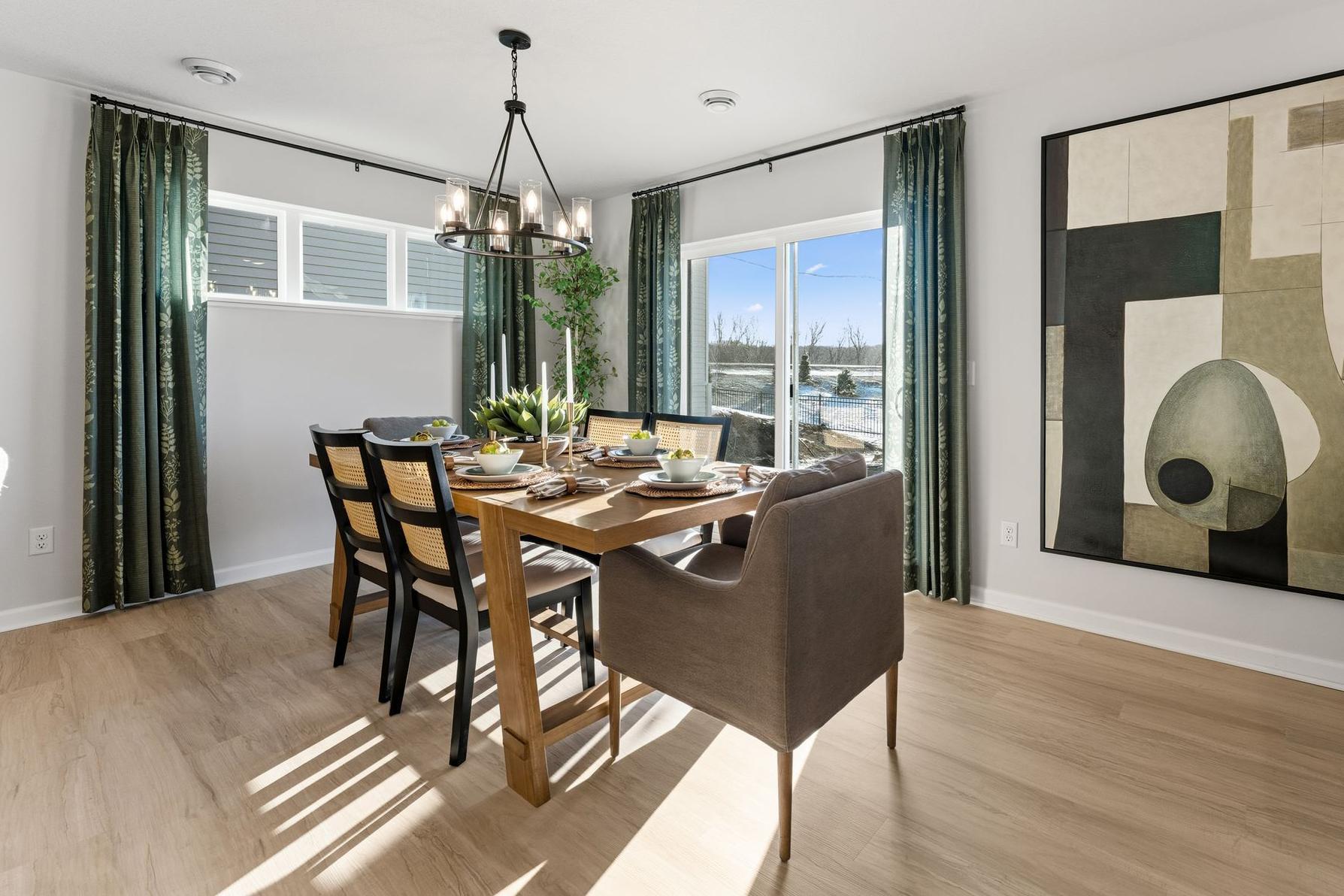 Lots of natural light in your dining room. Photo for reference only. Style, color and collections will vary.