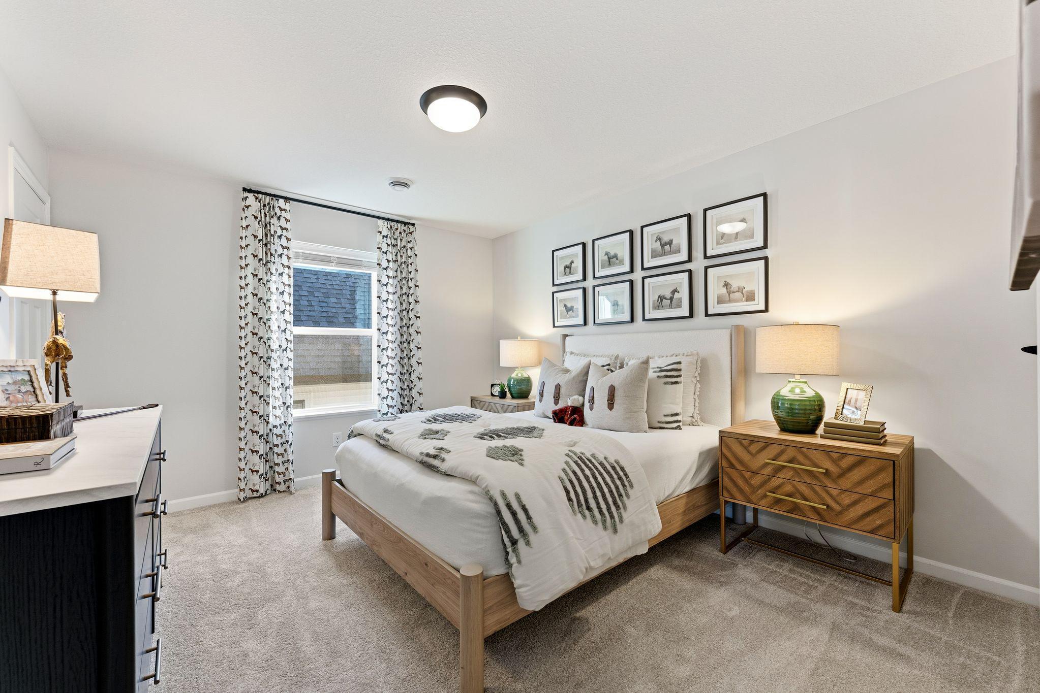 Upper level bedroom 3 of 3! Photo for reference only. Style, color and collections will vary.