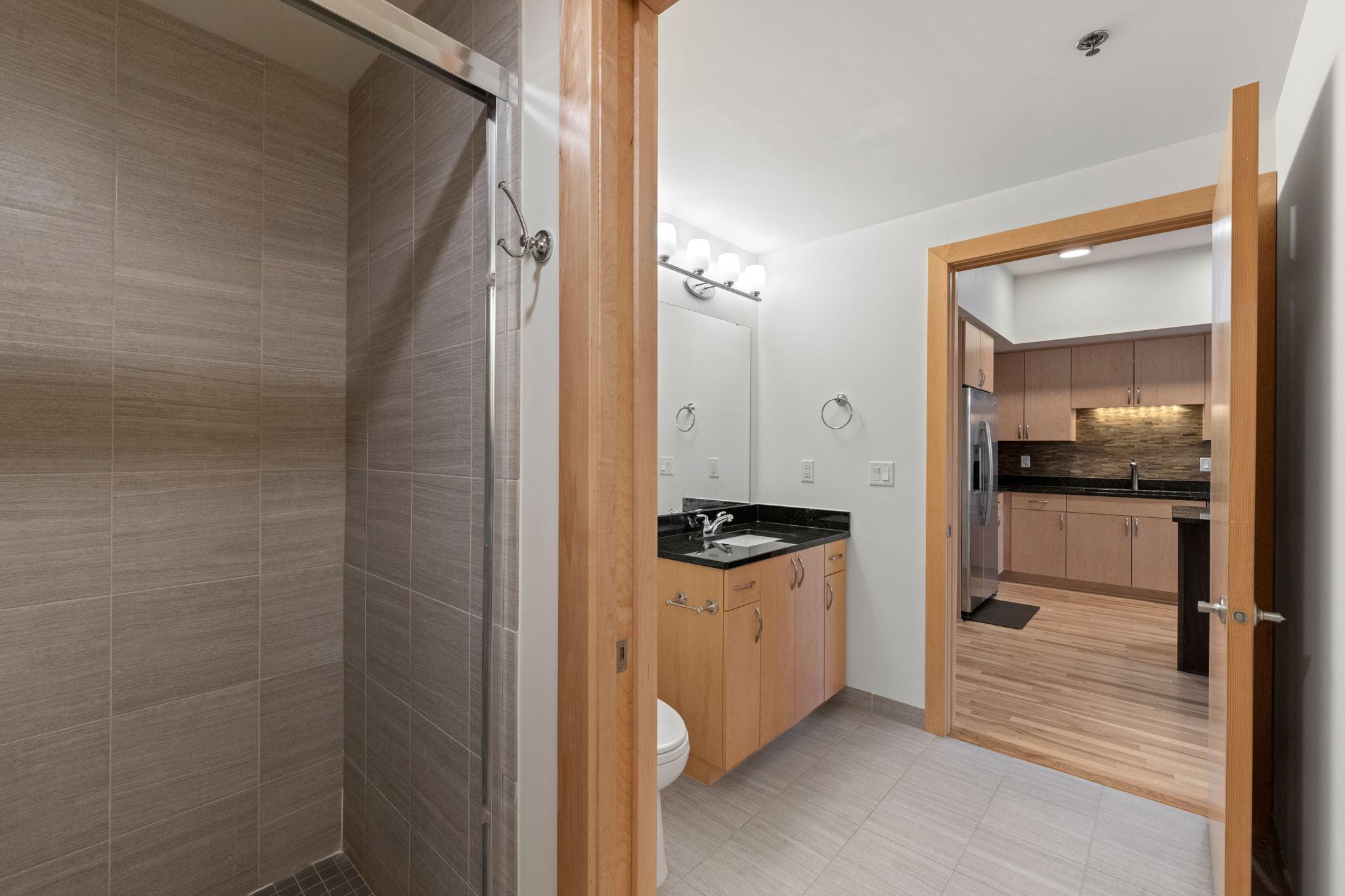 Pocket door between primary bathroom and powder bathroom