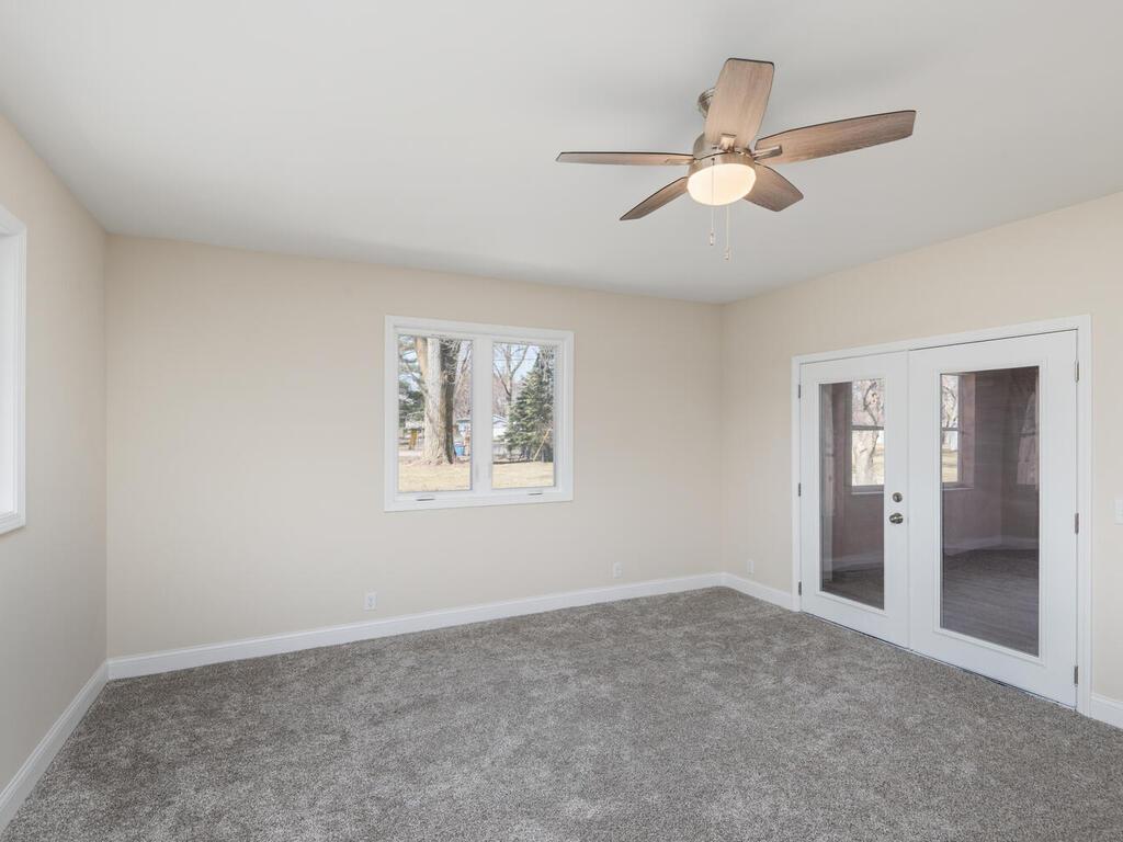 Family Room leads out to Three-Season Porch.