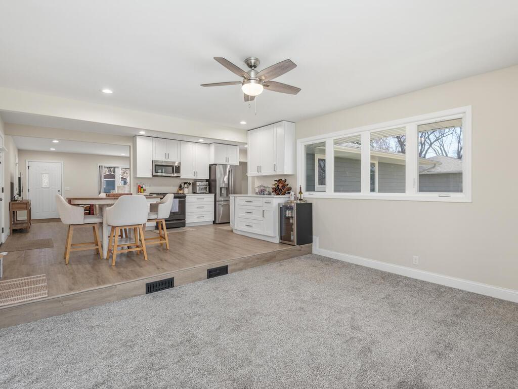 Main level Family Room opens to Kitchen/Dining area - perfect for entertaining!