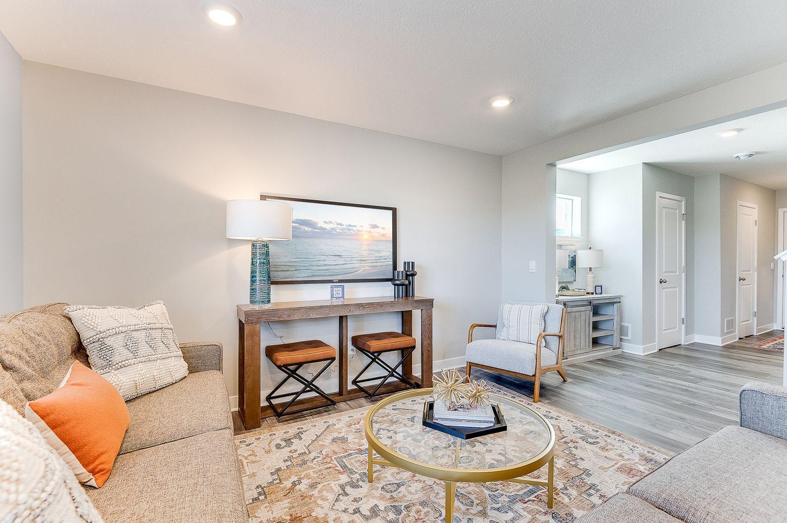 Every home is an end unit, which means more windows and light. (Model photo, colors may vary)