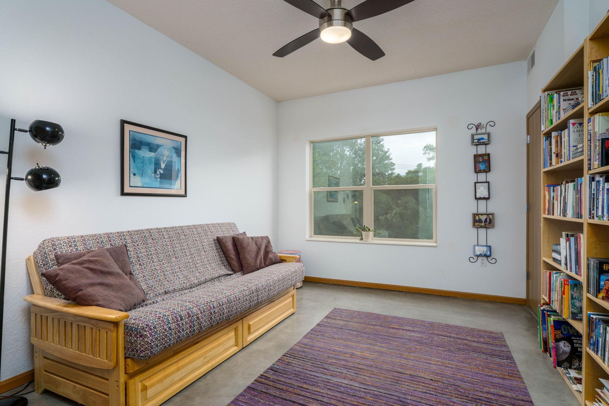 One of two of the bedrooms, both good size. West facing windows for lots of light. Currently used as a guest room.