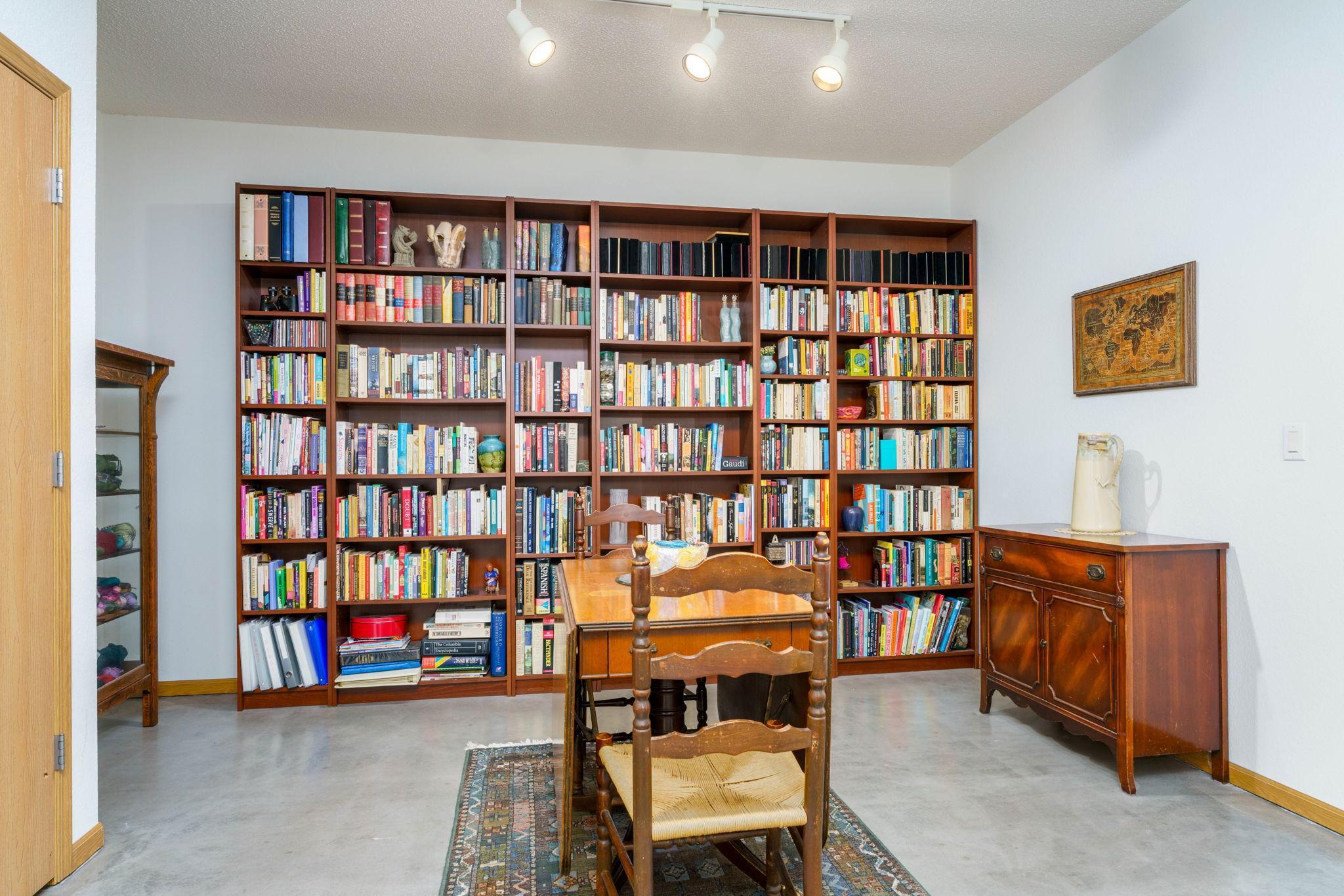 Dining room has plenty of space for entertaining and a larger table if you choose, or books!