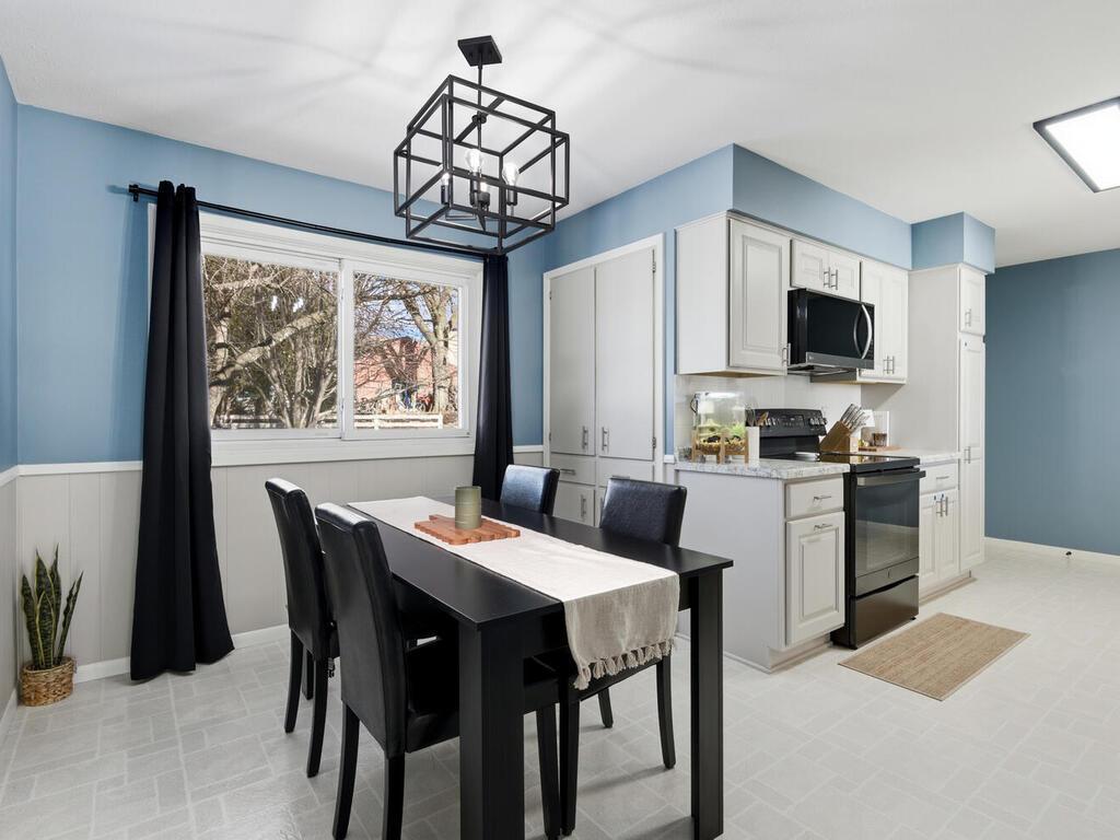 Stylish wainscoting and a fresh two-tone paint palette.