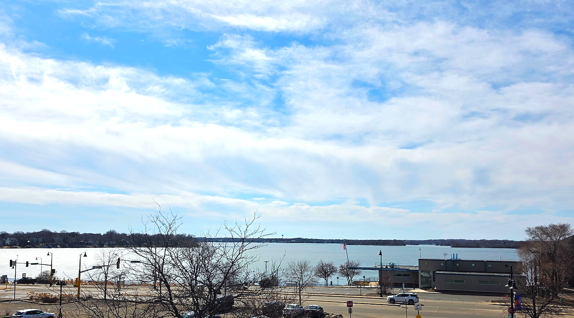 Corner unit with stunning Lake Minnetonka views! Private deck, and just steps to the marina, trails, and dining. *Full interior/exterior professional photos to come on 4/8*