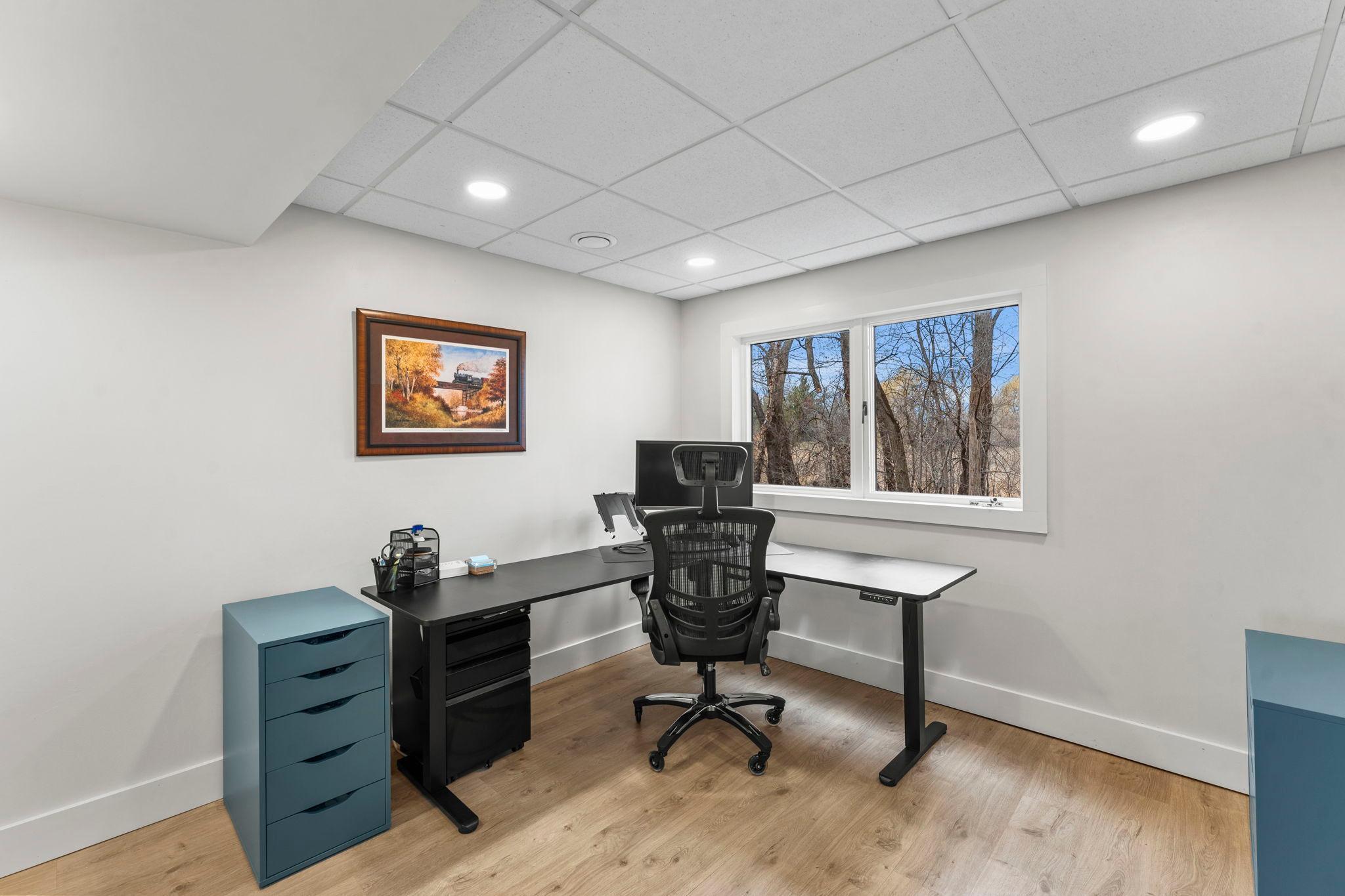 The lower level also includes a fifth bedroom with ample closet space and a nearby ¾ bathroom.