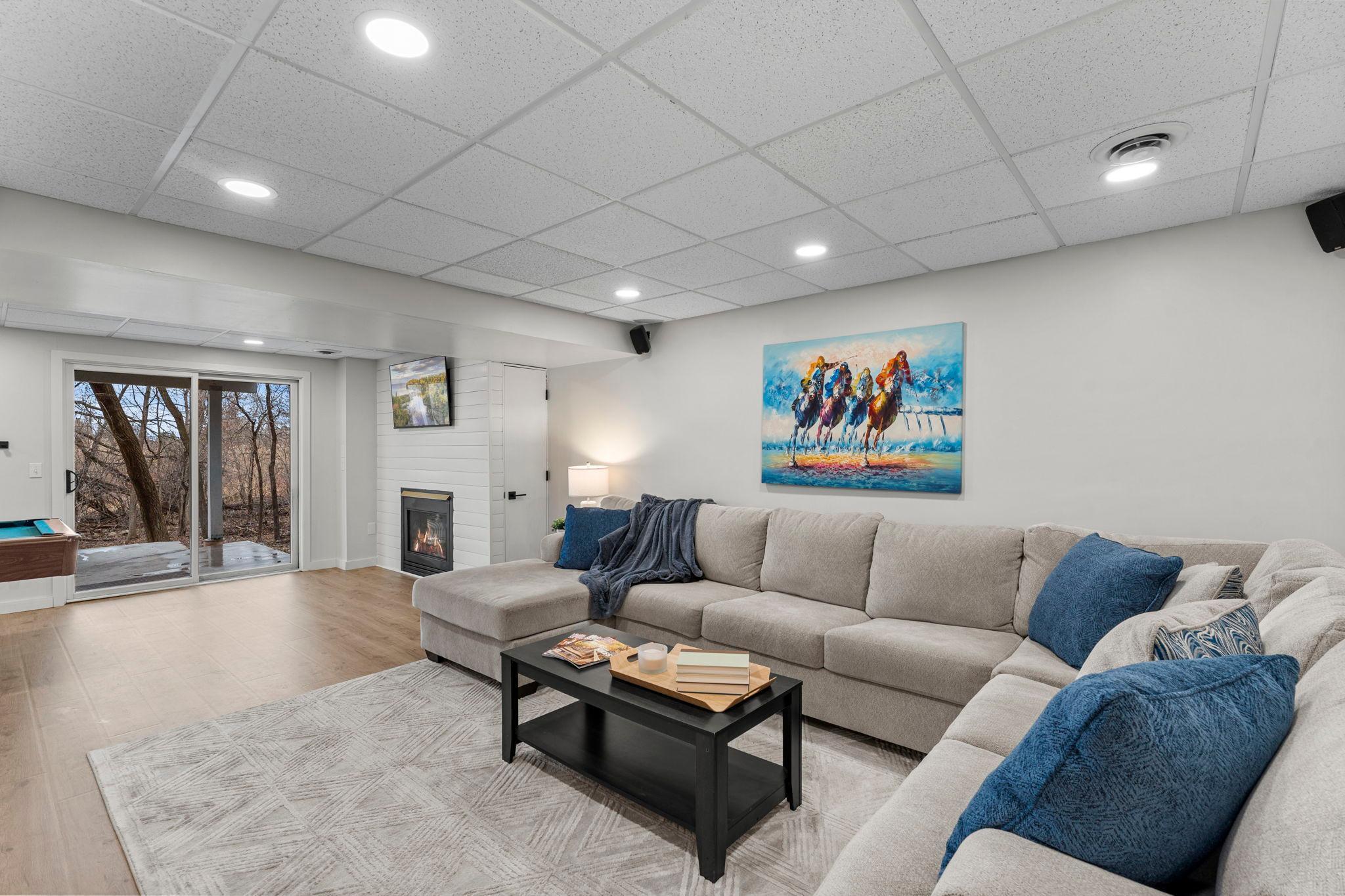 This level offers a spacious family room and recreation area.