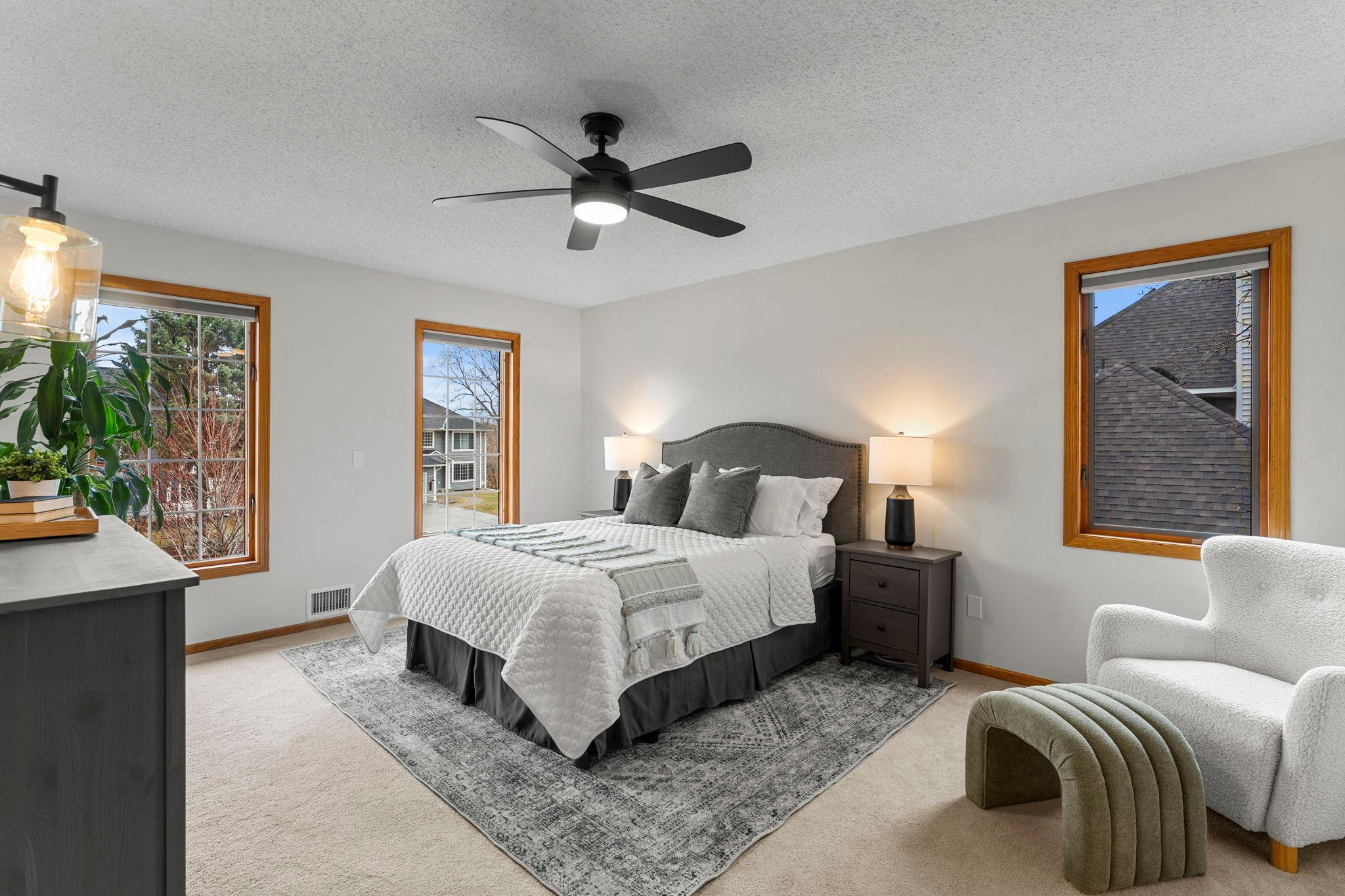 Upstairs, you’ll find four bedrooms, including a spacious primary suite with carpeting, ceiling fan, large windows, an 8x6 walk-in closet, and a private ensuite.