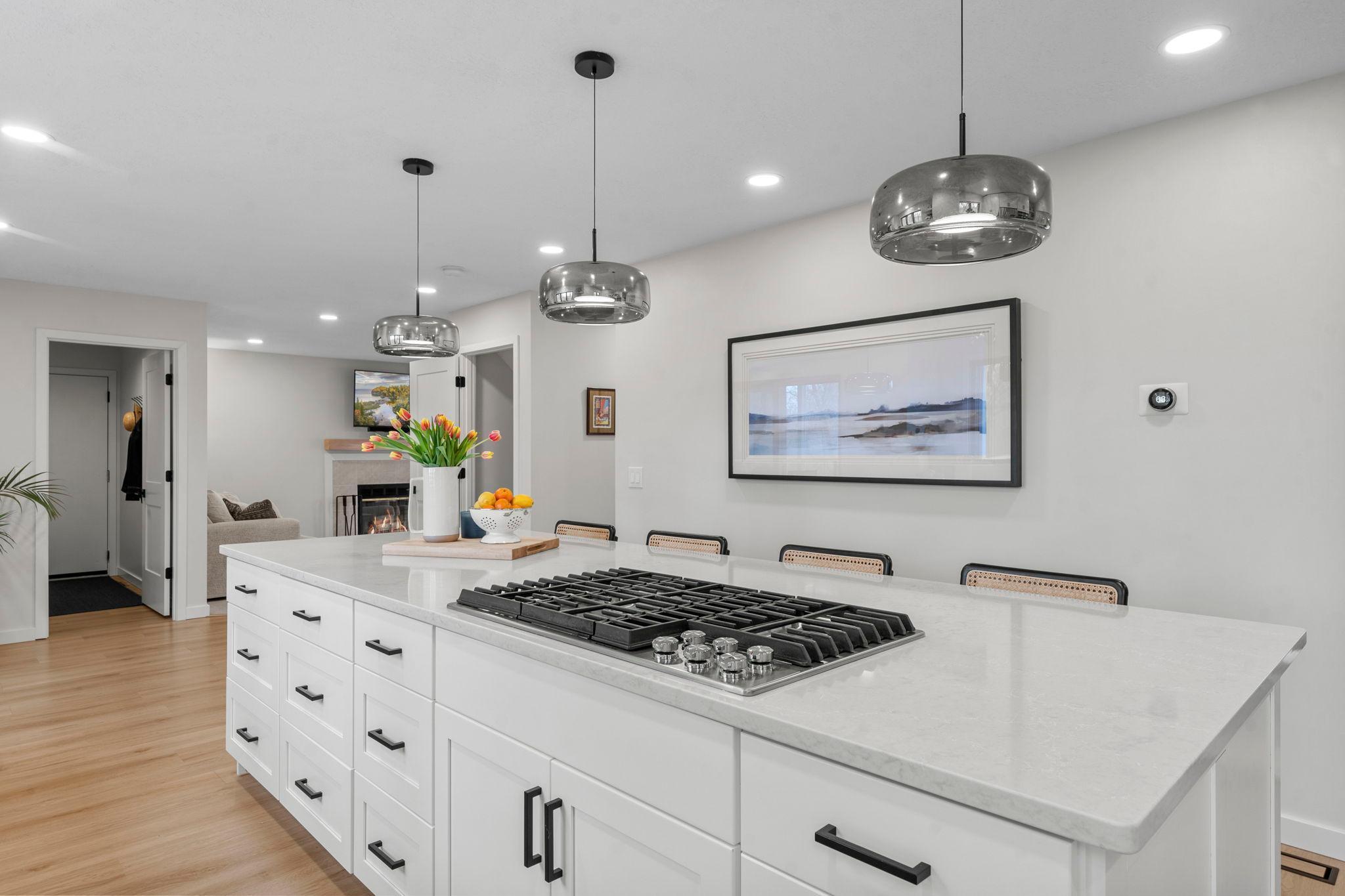 The kitchen offers access to both the informal and formal dining spaces, making it ideal for everyday living and entertaining.