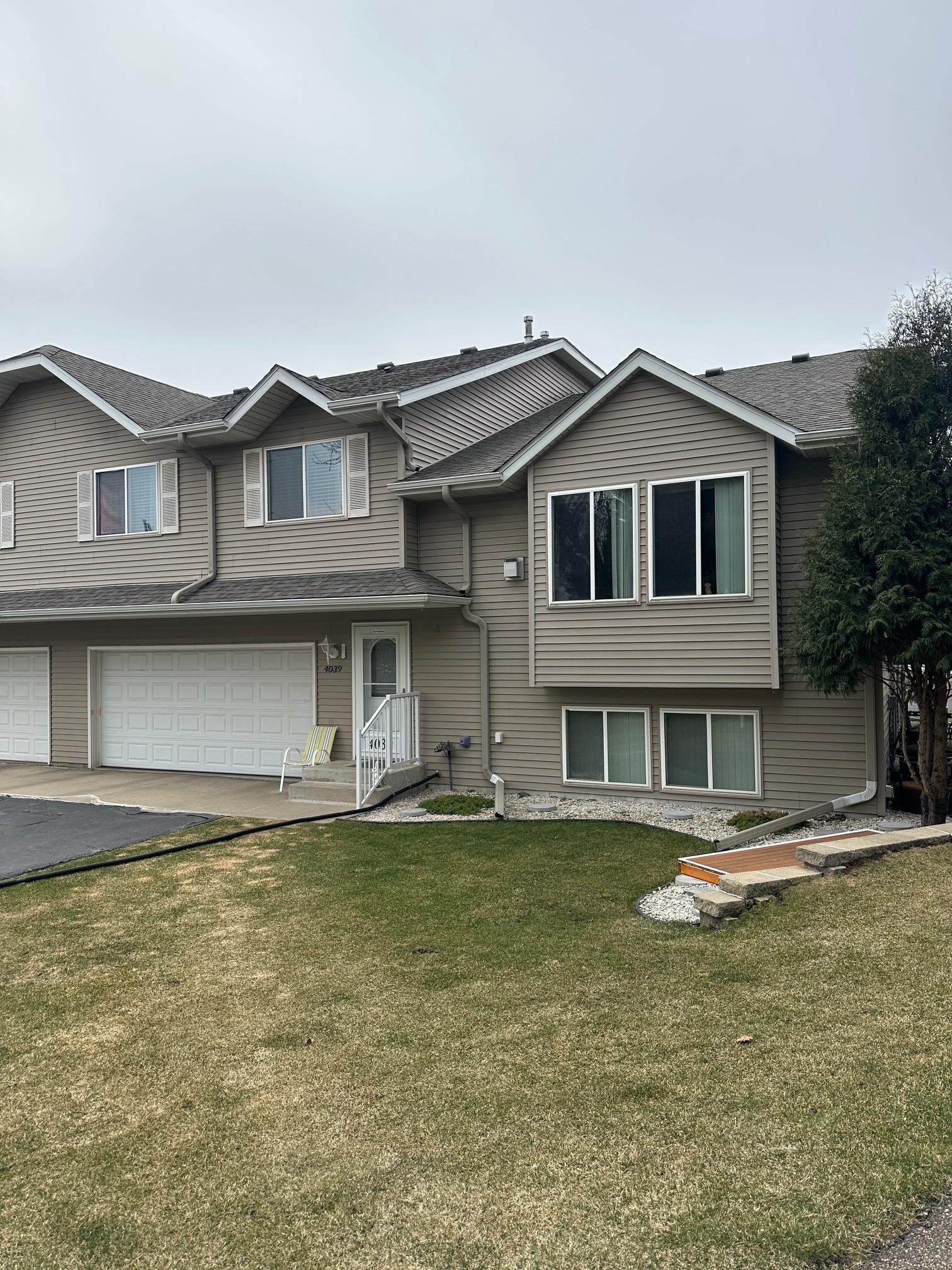 Front view, asphalt drive