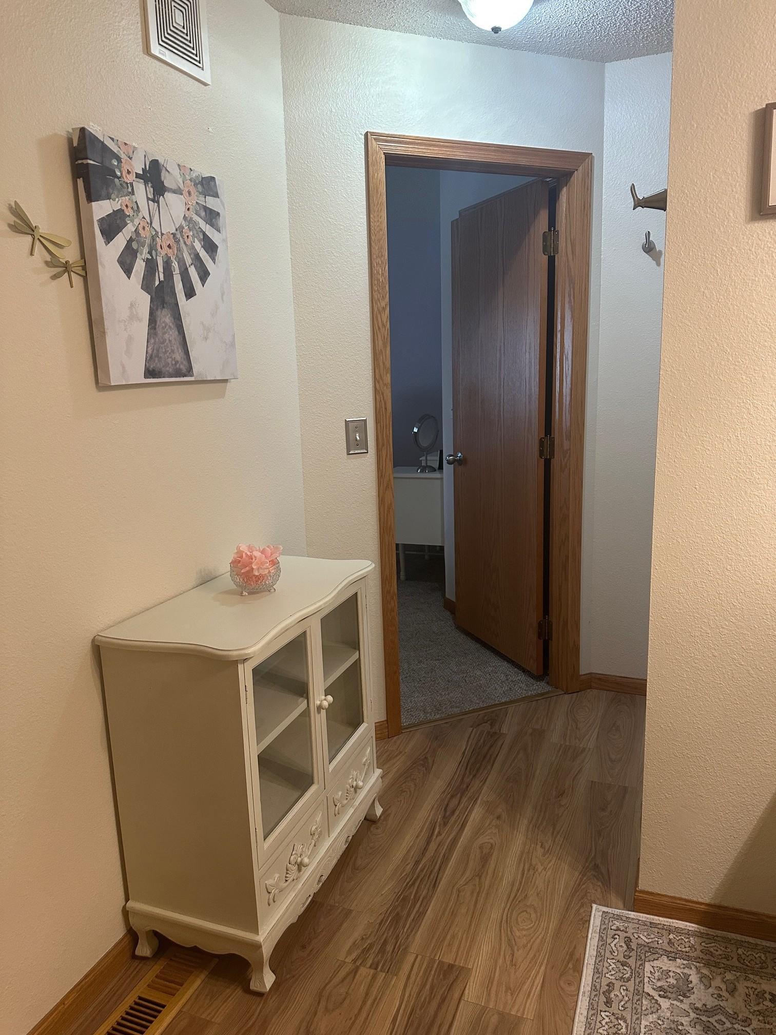 Master bath entrance to M. Bedroom