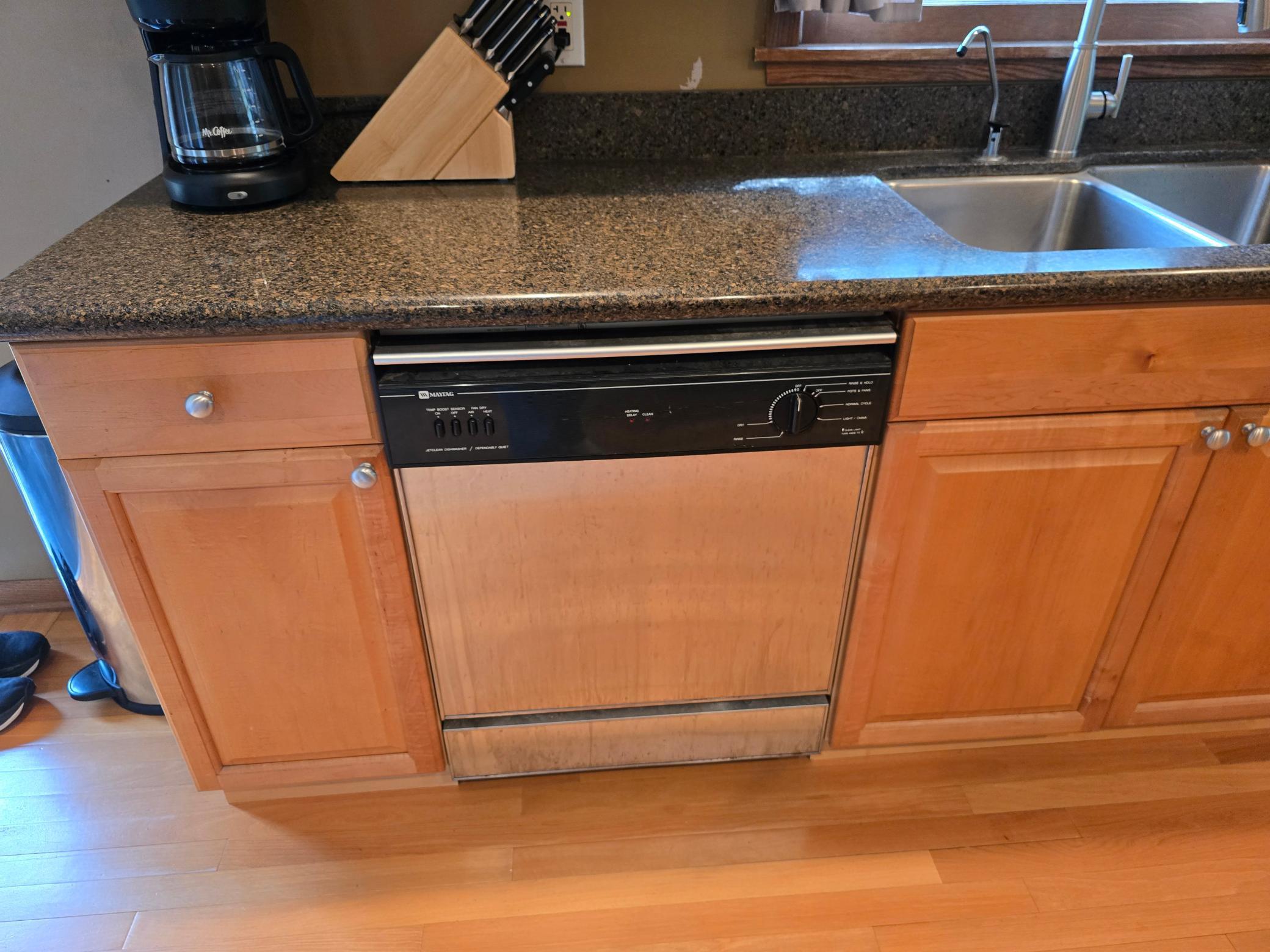 Newer stainless steel dishwasher for modern convenience and style.