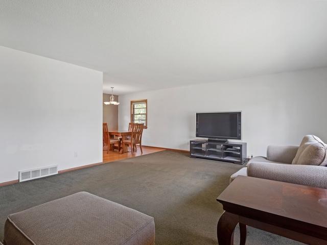 Enjoy seamless entertaining with a living room and dining area that flow together beautifully.